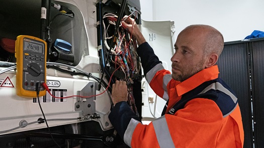 DAF technician working in workshop dealership