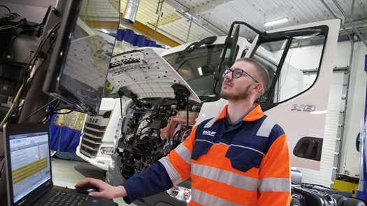 DAF technician working in workshop dealership